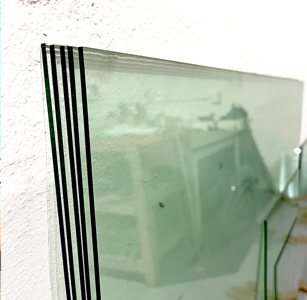 A stack of glass sheets ready to be cut